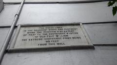 Colorful nameplates hanging on a wall in Kolkata