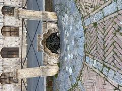 drain at the bottom of Piazza del Campo