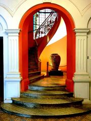 Ho Chi Minh City Museum of Fine Arts interiors with artistic staircase