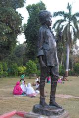 Sculpture of brave hunting boy in Sayaji Garden