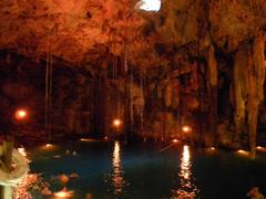 Cenote Dzitnup underground with natural ceiling hole