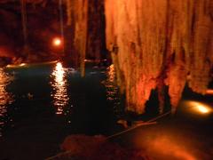 Cenote Dzitnup underground with a hole in the ceiling