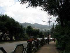 Scenic view of Conoor with lush greenery and hills