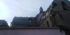 deteriorated roof and facade of a church