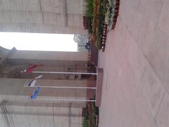 historic Delhi Gate with flags