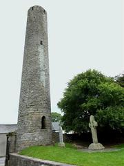 Kells monastery round tower and South Cross in County Meath, Ireland