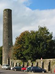 Churchyard Wall in Kells, County Meath, Ireland with Round Tower