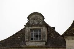 Chancelade Abbey window featuring St. James shell in France