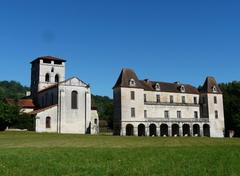 view of the abbey church and the Abbot's lodge in Chancelade from the park