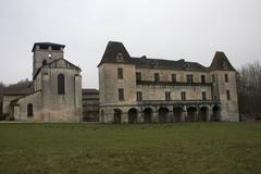 Abandoned Abbot's home with gothic windows, balustrades, and 18th-century pavillon