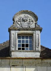 Adorned dormer window, house of the abbot, abbey of Chancelade, Dordogne, France.