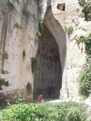 Exterior view of the Ear of Dionysius at Archaeological Park in Syracuse, Sicily