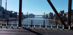 Roosevelt Island Bridge with Ravenswood generation plant and Queensboro Bridge