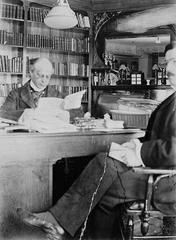 Sir Wilfrid Laurier with his secretary Mr. Boudrias in his library in Ottawa