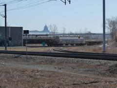 Montellier suburb train station platforms with a view of Saint Joseph's Oratory in Montreal