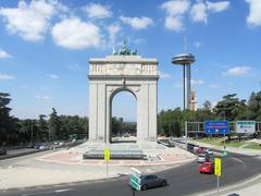 Arco de la Victoria in Madrid with Faro de la Moncloa and Museo de América tower in the background