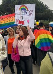 Two mothers offering free hugs during a march