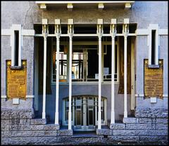 Detailed view of Cauchie House entrance