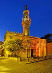 El Moez Street in Cairo, Egypt featuring historic architecture and city life