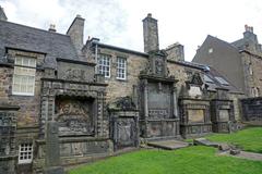 Greyfriars Graveyard in Edinburgh with historic tombstones and trees