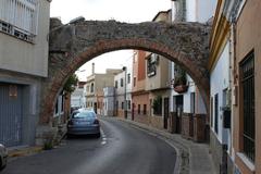 arcade ruins of the Algeciras Aqueduct integrated among houses in Algeciras, Andalusia, Spain