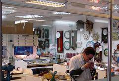 two watchmakers repairing watches in a workshop in Santiago de Chile