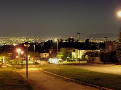 A panoramic view of Alto Macul in Santiago, Chile with houses and mountains in the background