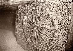 Skull and bone sculpture in Paris Catacombs, 1929