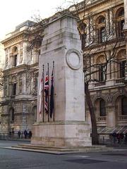 Cenotaph of white stone monument standing tall against a blue sky