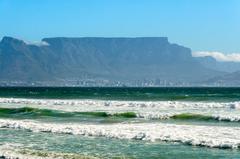 Bloubergstrand beach with ocean waves and Table Mountain in the background, South Africa