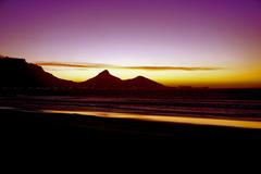 View of Lion's Head mountain during sunset from Bloubergstrand, Cape Town