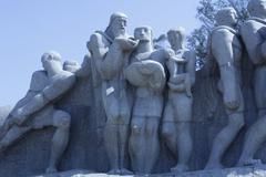 Bandeirante with long beard in Monumento às Bandeiras family sculpture