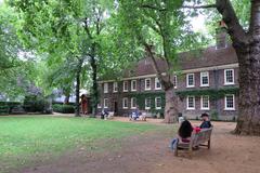 Benches on a lawn outside the Museum of the Home in London