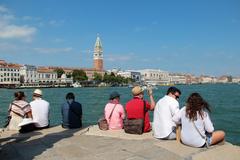 View of Bacino di San Marco, Riva degli Schiavoni, Giardini Reali, Campanile, St. Mark's Basilica, Zecca, and Doge's Palace from Punta della Dogana in Venice, Italy.