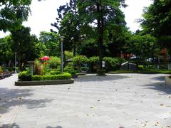 Chiang Wei-shui Memorial Park with pavilion, flower beds, and playground equipment