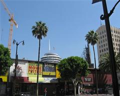 Hollywood Boulevard near Vine Street on a weekday morning with Capitol Records building and construction crane in the background