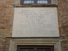 Panoramic view of Urbino with historic buildings and lush green landscape