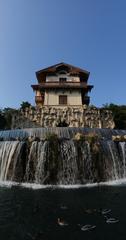 Cascade de Gairaut waterfall with historical building in Nice, France