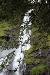 Cascade du Rouget partially hidden by vegetation