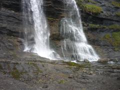 Cascade du Rouget Waterfall in a lush forest setting