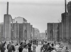 1957 construction site with workers and machinery