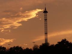 El Desafío ride with sunset clouds, Isla Mágica, Seville, Spain.