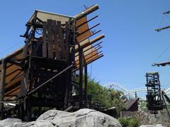 Wooden towers by the lake at Isla Mágica theme park in Seville