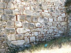 Main entrance gate of Berat Fortress with ancient defensive walls