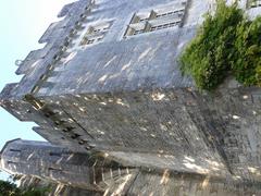 Chateau de Crazannes with lush green lawns and towers