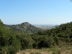 northeast view of Hyères castle hill from Mont Fenouillet with Maurettes range and Porquerolles island in the background