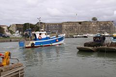 Fishing trawler 'Illusion' navigating in the port of Le Château d'Oléron