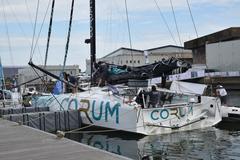 60 feet IMOCA Corum sailboat at Lorient harbor in May 2021