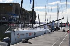 IMOCA 60 sailboat of Offshore Team Germany docked in Lorient