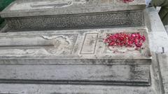 Grave with flowers in Nizammudin Tomb premises